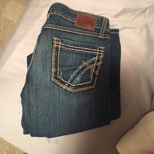 Boot cut buckle jeans