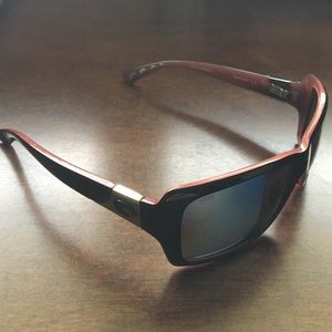 Women's, black & pink Costa sunglasses.