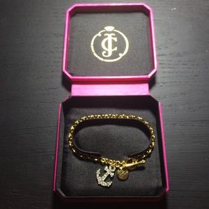 Gold Juicy Couture Bracelet with a diamond anchor