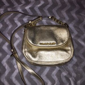 Gold metallic michael Kors matching purse & wallet