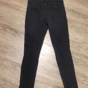 Black skinny jeans with some holes