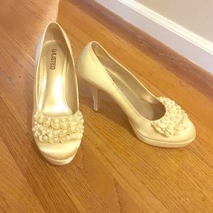 White pearl platform heels