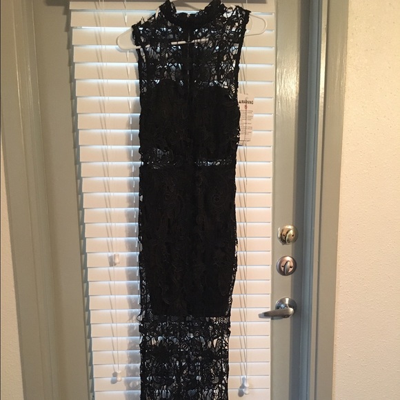 Floor length black lace dress. BRAND: ANGL