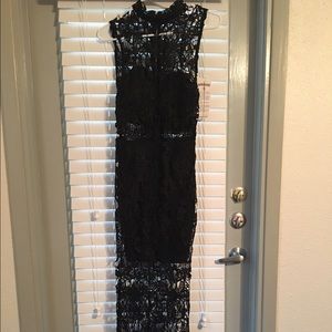 Floor length black lace dress. BRAND: ANGL
