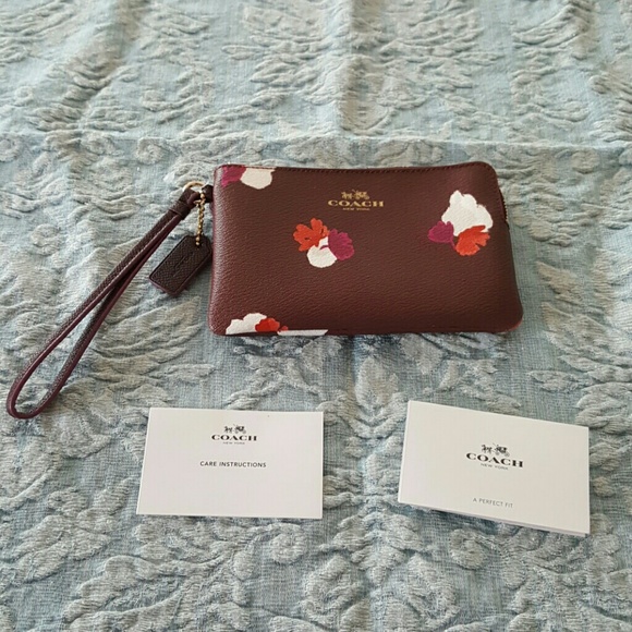 Coach petals aubergine color wristlet 6x4x0.5 inch