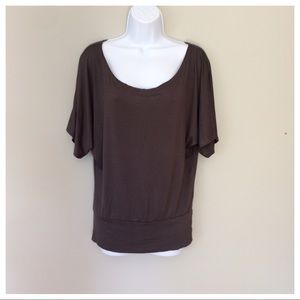 Gray short dolman sleeve top.
