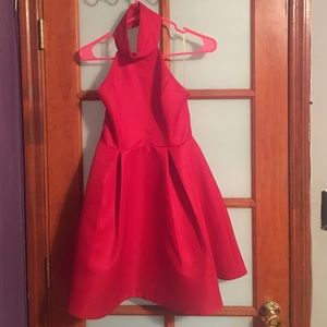 Red backless peplum dress.