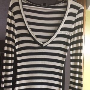 Bebe Small shirt made of 97% Rayon, 3% Spandex