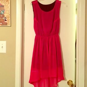 Hot pink drop hem dress.