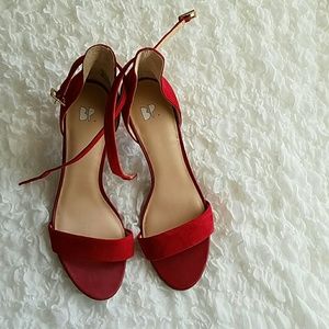 Red strappy heels