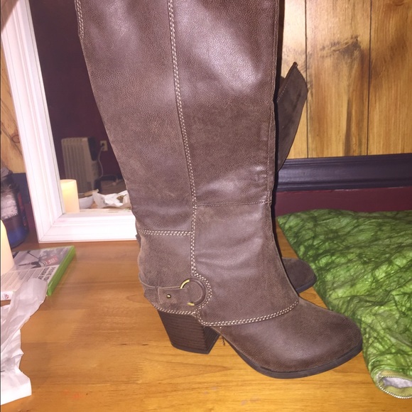 Tall heeled boots.