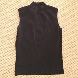 Black cutoff turtleneck tank.