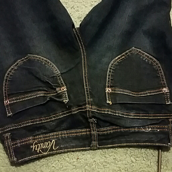 Dark blue vanity mid-skinny jeans.