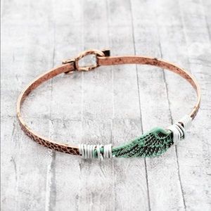 WIRE-WRAPPED PATINA WING ON COPPER TONE BANGLE
