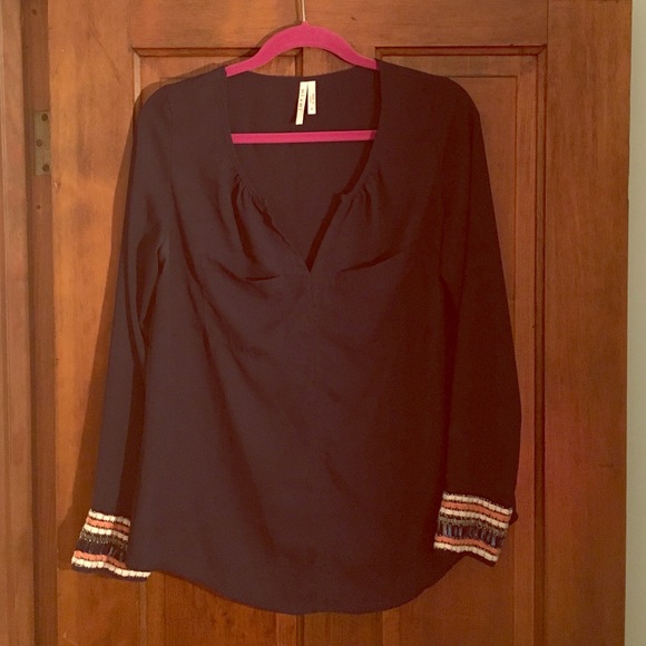 Navy blouse with beaded cuffs