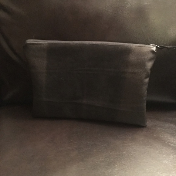 Black leather clutch bag