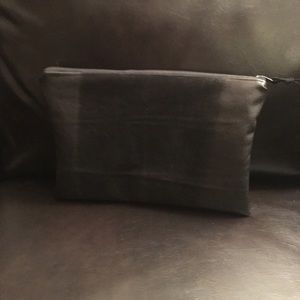 Black leather clutch bag
