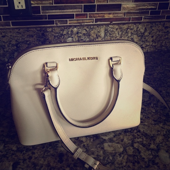 Handbags - Michael Kors hand bag.
