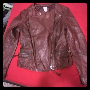 Brown leather jacket with asymmetrical zipper