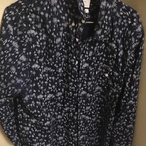 Blue dress shirt with winter print design.