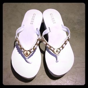 Brand New Guess flip flop (size 6)