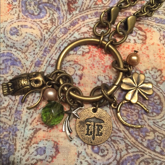 Lenny and Eva gold tone necklace with charms