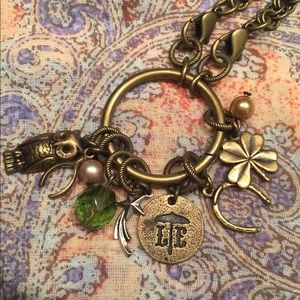 Lenny and Eva gold tone necklace with charms