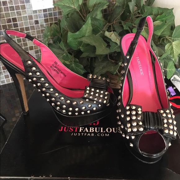 Studded black sling back heels