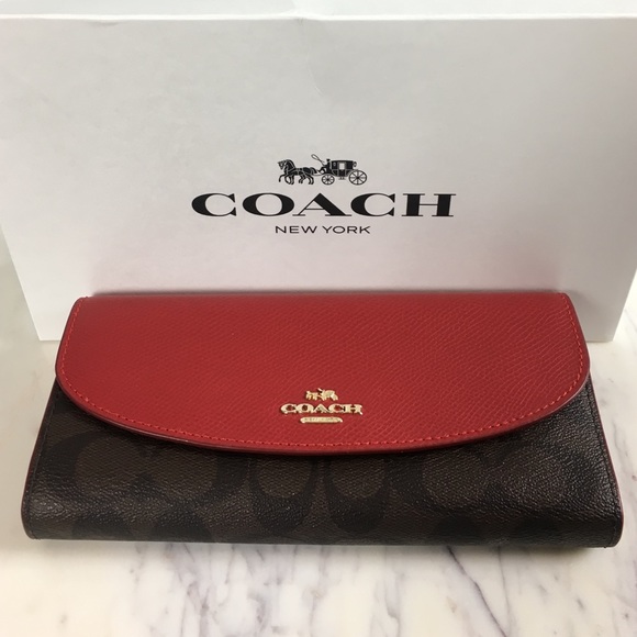 Coach Handbags - ✨🛍S A L E🛍✨NWT Coach Leather Envelope Wallet!