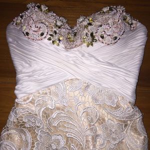 Brand new, never worn, White/Cream colored Gown.