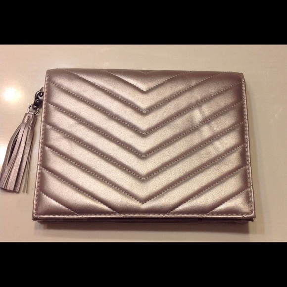 Nice Neiman Marcus Tassel clutch.