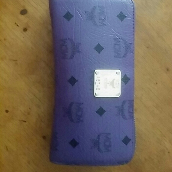 Purple MCM Wallet Gently used/  perfect as is sell
