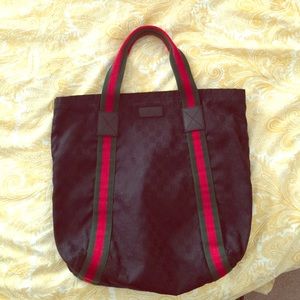 Auth. Gucci black fabric tote with colored strap