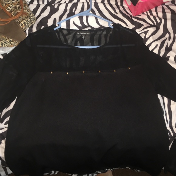 A shear studded black shirt