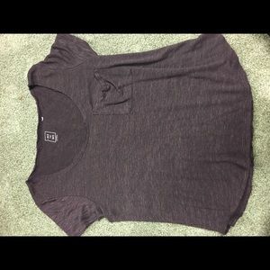 Me to We purple shirt