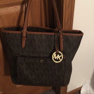 Michael Kors brown shoulder bag.