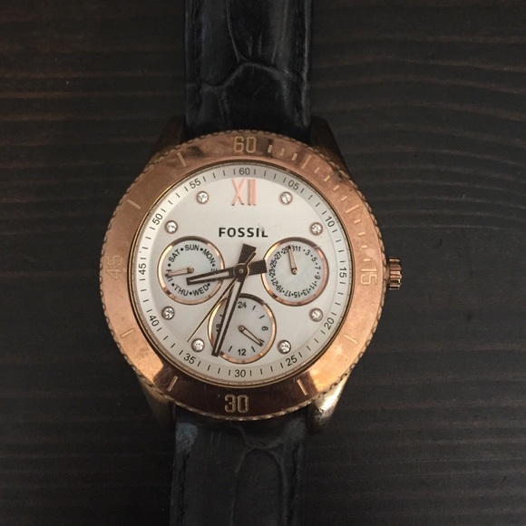 Fossil rose gold watch with black leather band