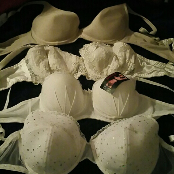 3 White, 1 Tan Bras