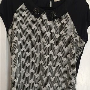 Dressy or casual top. Cute with skirt or jeans.