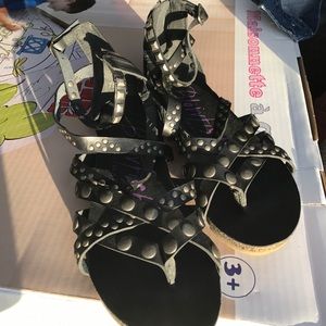 Black over the ankle sandals