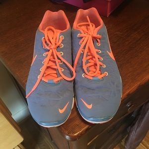 Blue and peach color Nike free run 5.0s 😊