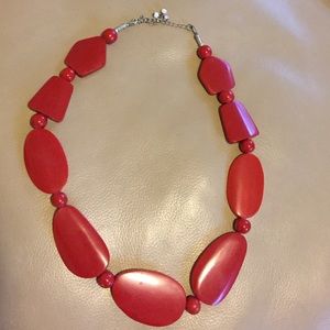 Red beaded necklace.