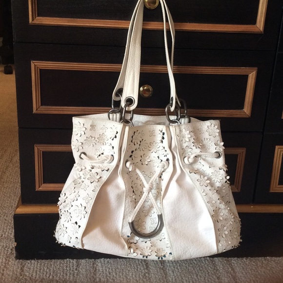 White Jessica Simpson handbag. Super cute details