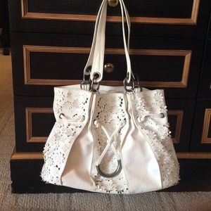 White Jessica Simpson handbag. Super cute details