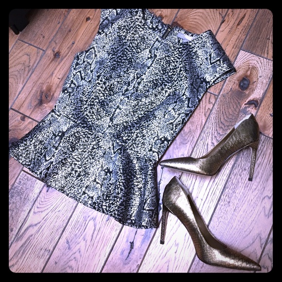 Love 21 Tops - Gold & Black Peplum Top Love 21 Tops - Gold & Black Peplum Top