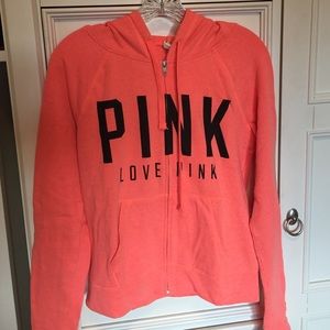 orange zip up jacket