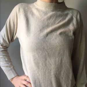 Cute nude sweater with zipper in the back