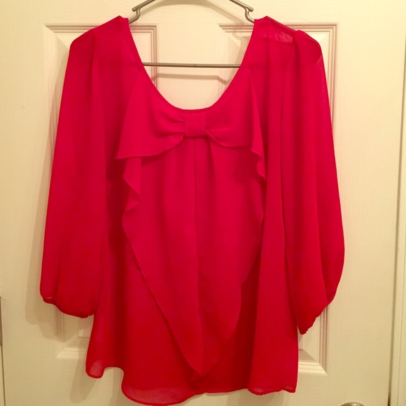 100% polyester red blouse with bow!
