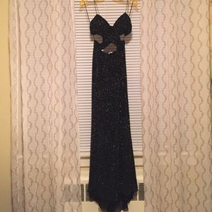 Fully beaded open back and side cut out gown