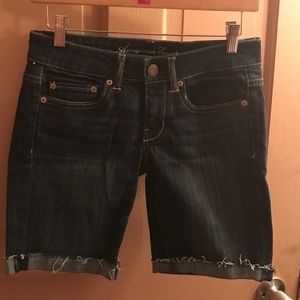 American Eagle mid length dark wash jean shorts